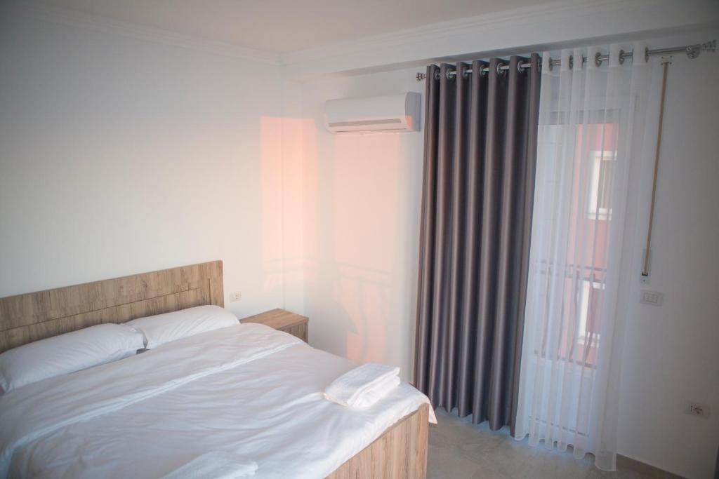 Postel nebo postele na pokoji v ubytování Soluna Apartments