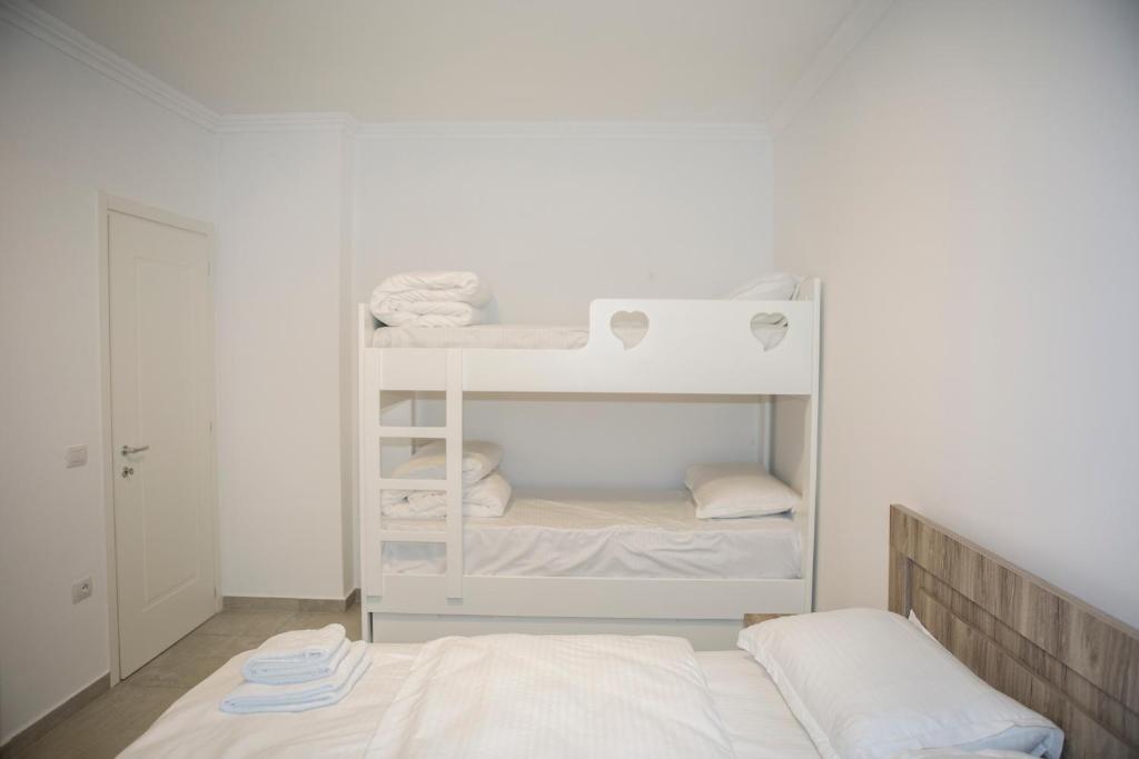 Postel nebo postele na pokoji v ubytování Soluna Apartments