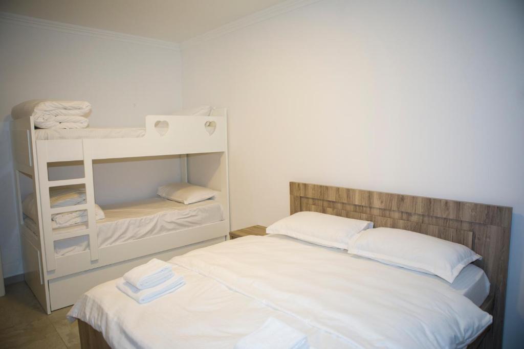 Postel nebo postele na pokoji v ubytování Soluna Apartments