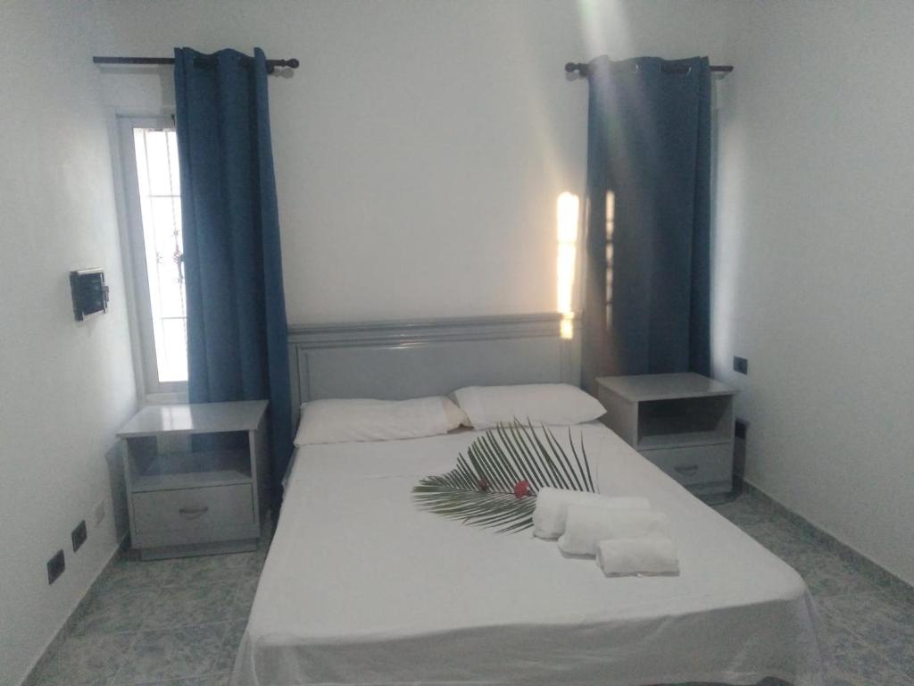 Postel nebo postele na pokoji v ubytování RECIDENCIAL MIGNOLI