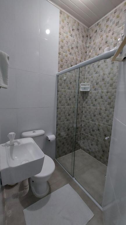 Koupelna v ubytování Mini suíte Atitude no centro de Maragogi