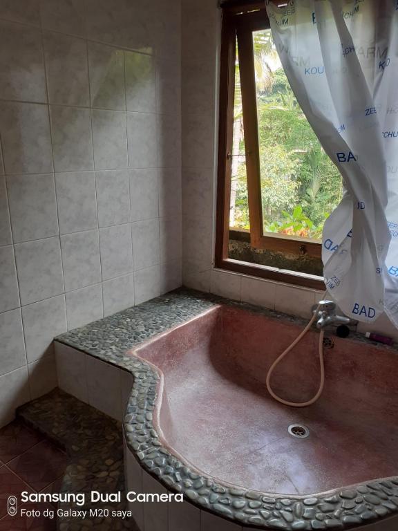 Fotografie z fotogalerie ubytování Sari Wangi Cottage v Ubudu