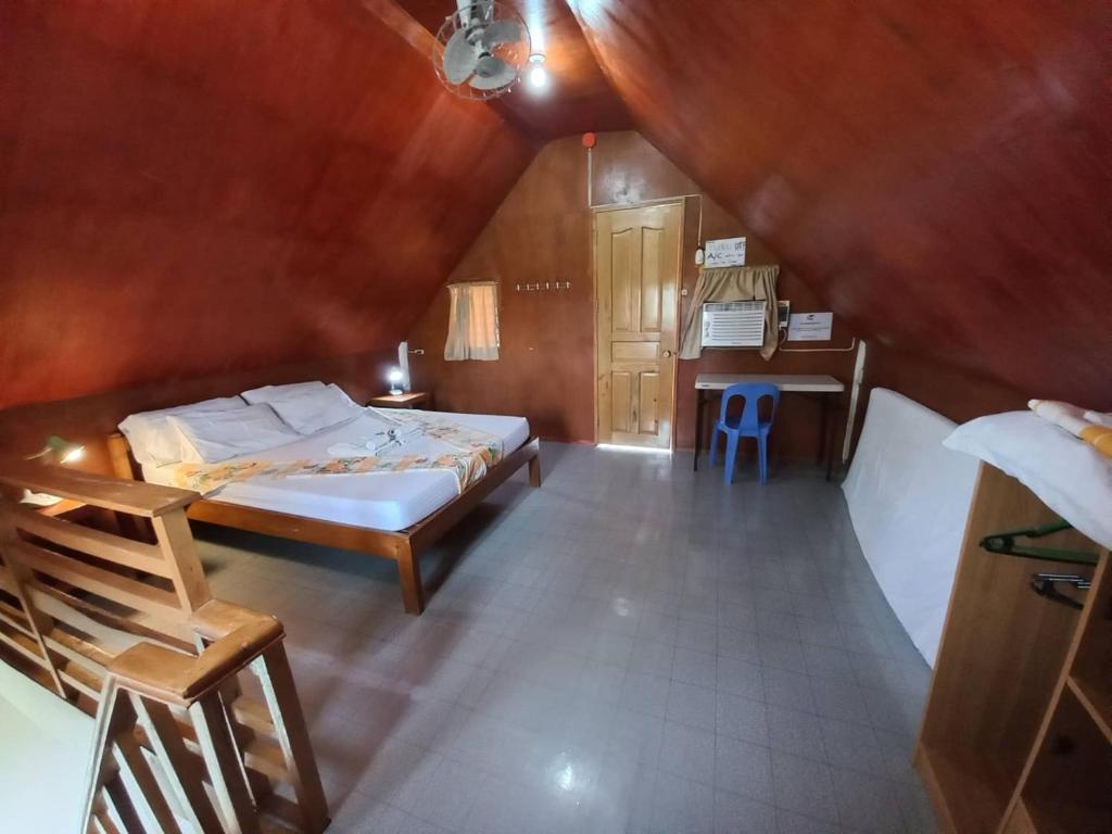 Postelja oz. postelje v sobi nastanitve Sambag Hideaway Bungalows