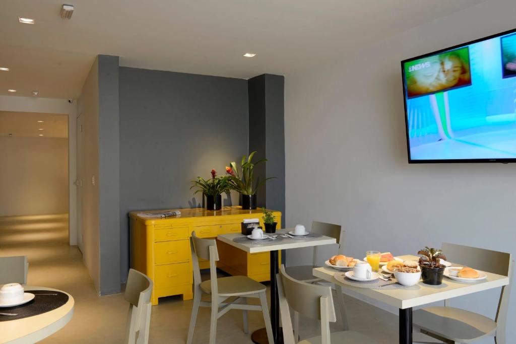 TV a/nebo společenská místnost v ubytování Bê Hotel