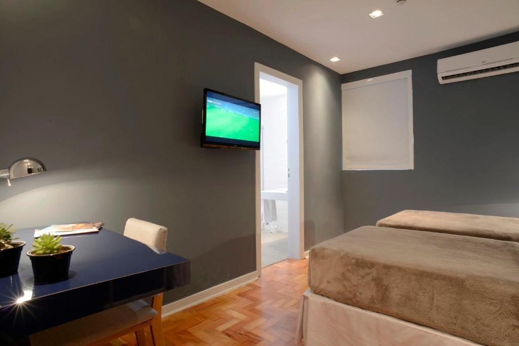 TV a/nebo společenská místnost v ubytování Bê Hotel