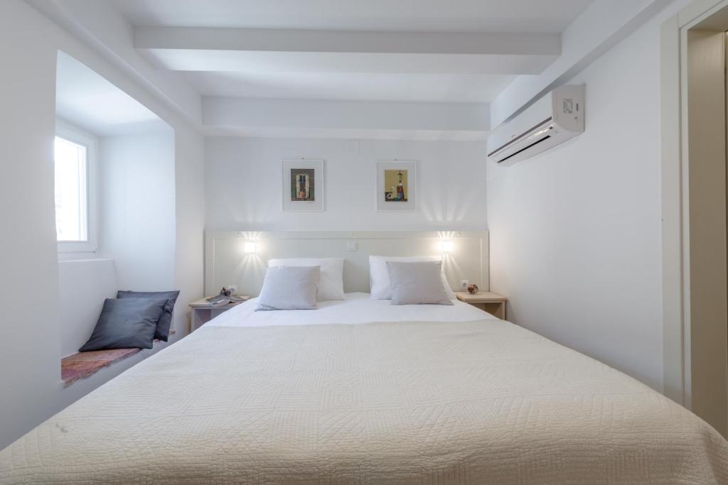 Posteľ alebo postele v izbe v ubytovaní Rooms Andro