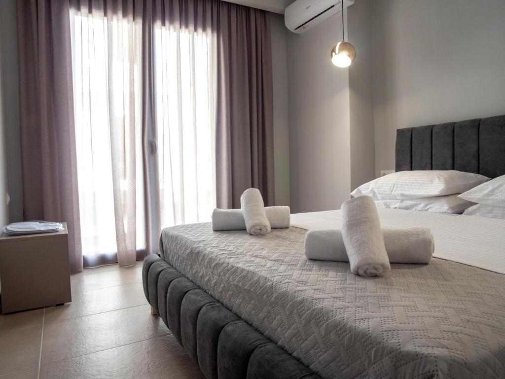 Posteľ alebo postele v izbe v ubytovaní CENTRAL URBAN LUXURY SEA VIEW APT SINCE 2009