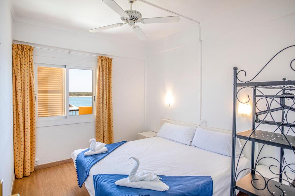 Voodi või voodid majutusasutuse Apartamentos Piza - Grupo Berna toas