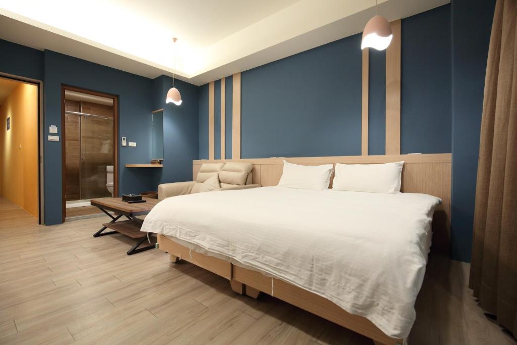 A bed or beds in a room at Pin House