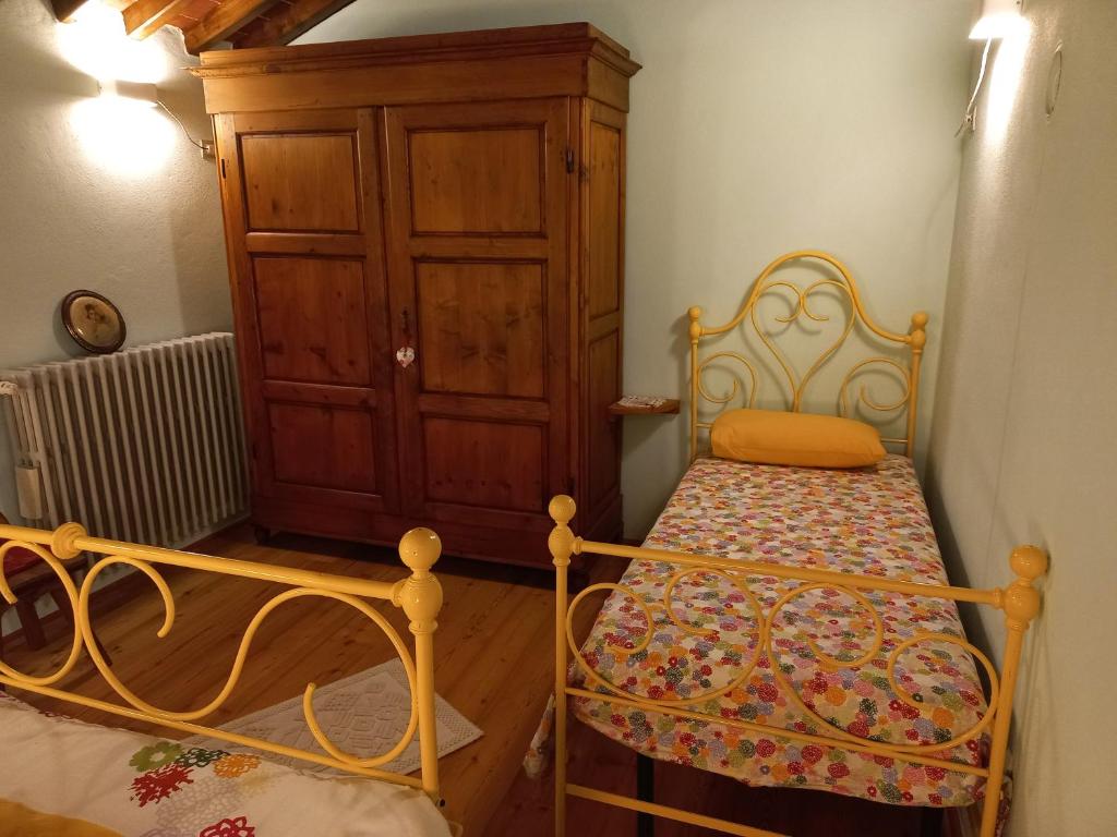 Postel nebo postele na pokoji v ubytování Il paradiso delle beccacce