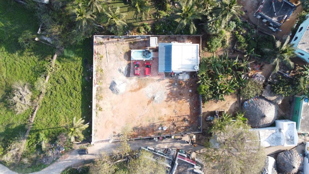 an aerial view of a house with a truck at Bay Front Home in Visakhapatnam