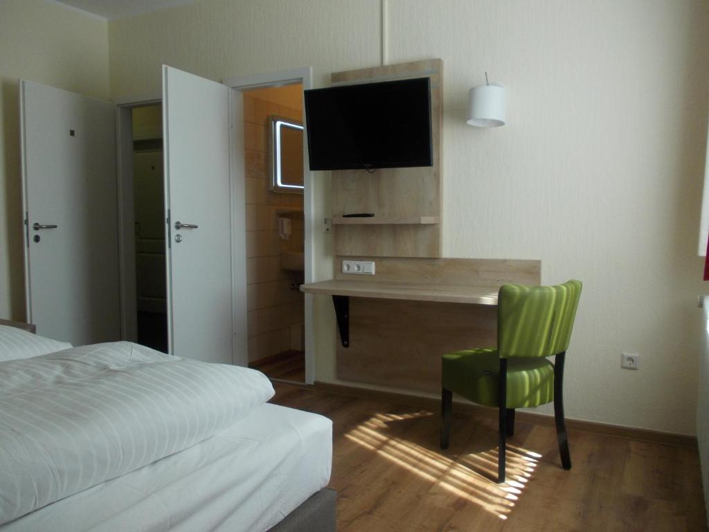 Postel nebo postele na pokoji v ubytování Berghotel Glockenberg