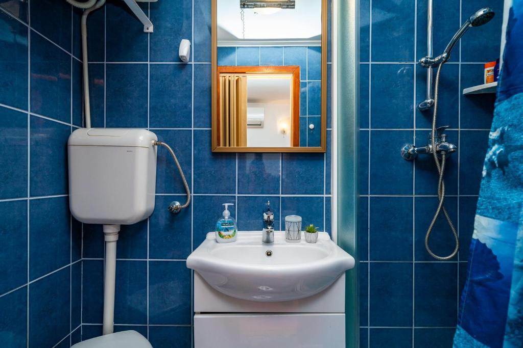 Kúpeľňa v ubytovaní Rooms Fausta Old Town