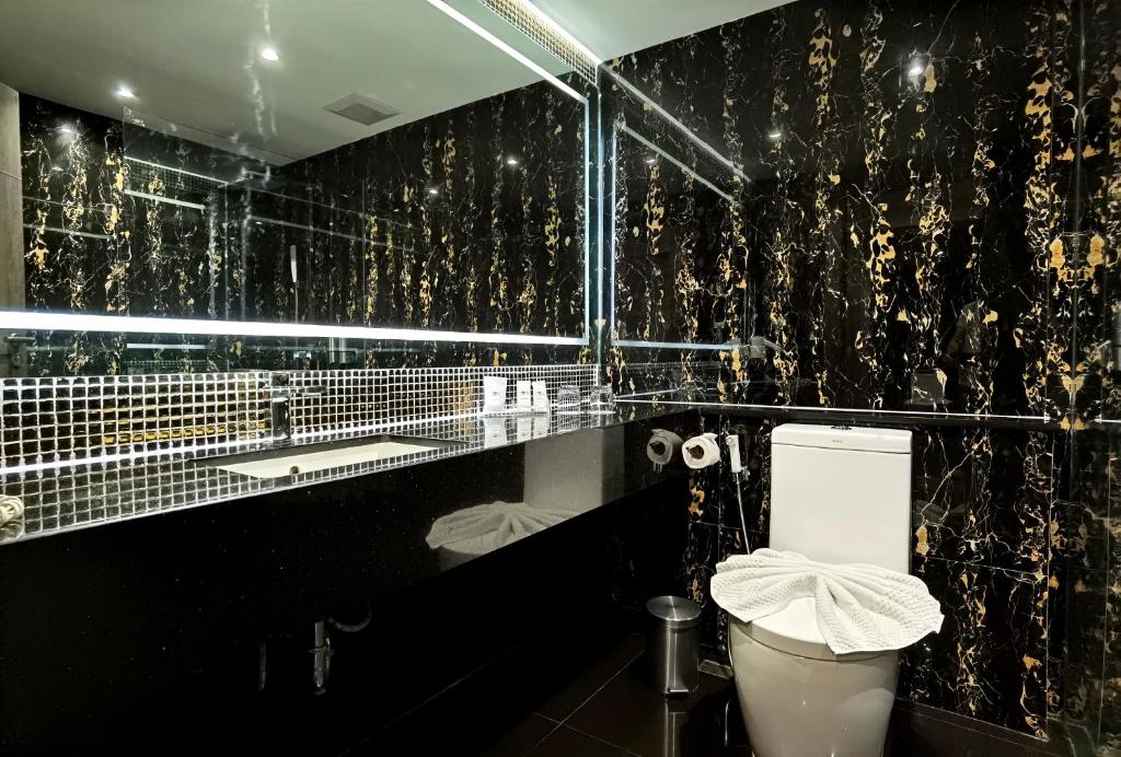 Koupelna v ubytování Nova Express Pattaya Hotel