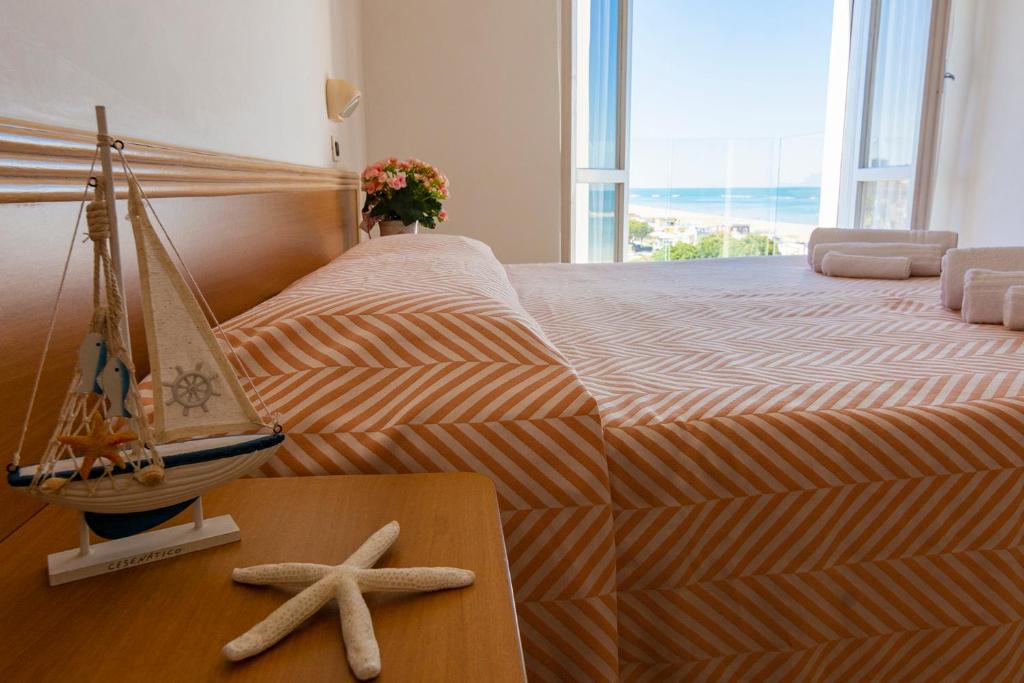 Postel nebo postele na pokoji v ubytování Hotel Atlas