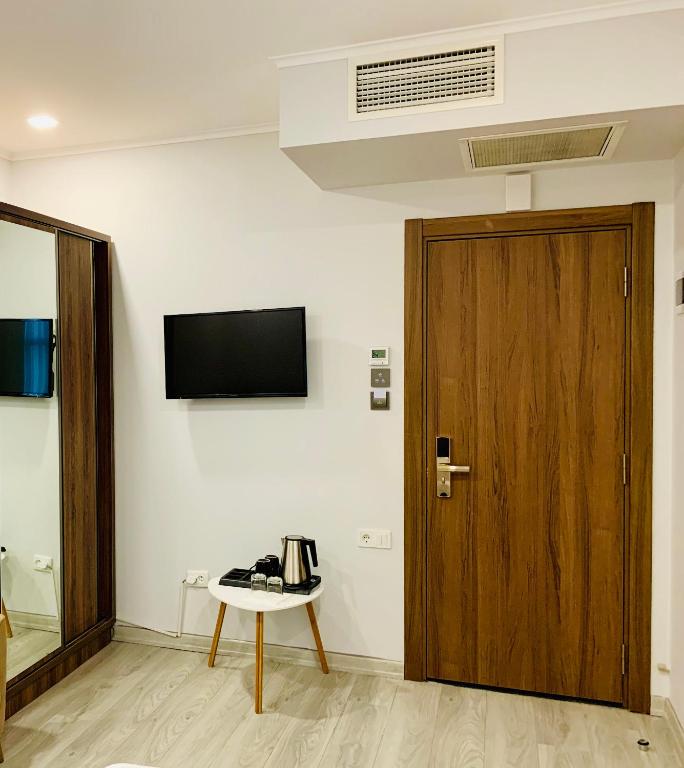 TV a/nebo společenská místnost v ubytování Hotel Tsereteli Palace