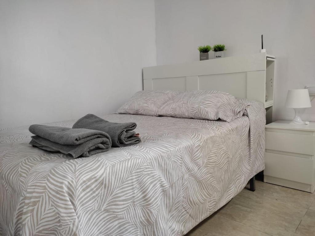 Posteľ alebo postele v izbe v ubytovaní El Tabanquito