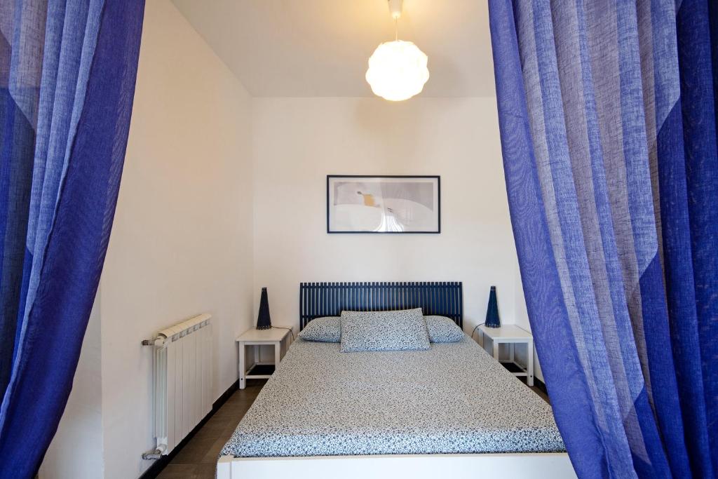 A bed or beds in a room at Fattorialmare Blu