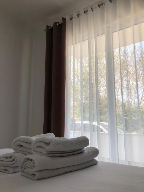 Voodi või voodid majutusasutuse Apartments kupi ul rudaj 41 toas