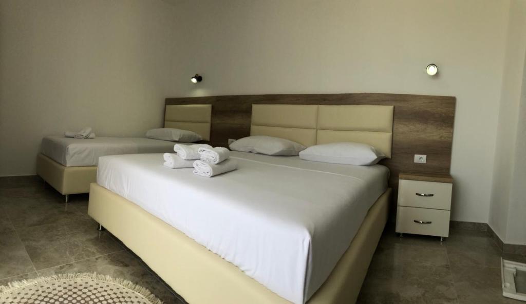 Voodi või voodid majutusasutuse Apartments kupi ul rudaj 41 toas