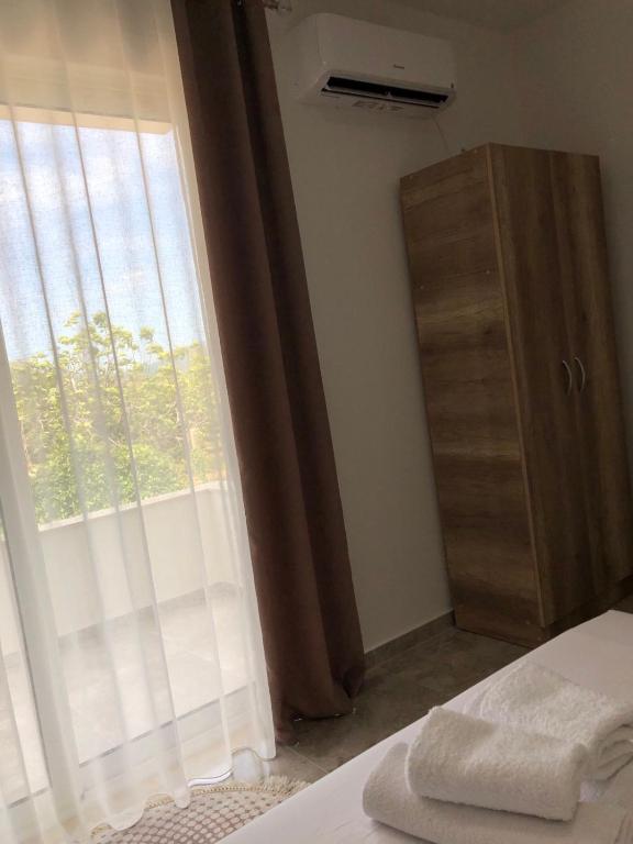 Voodi või voodid majutusasutuse Apartments kupi ul rudaj 41 toas