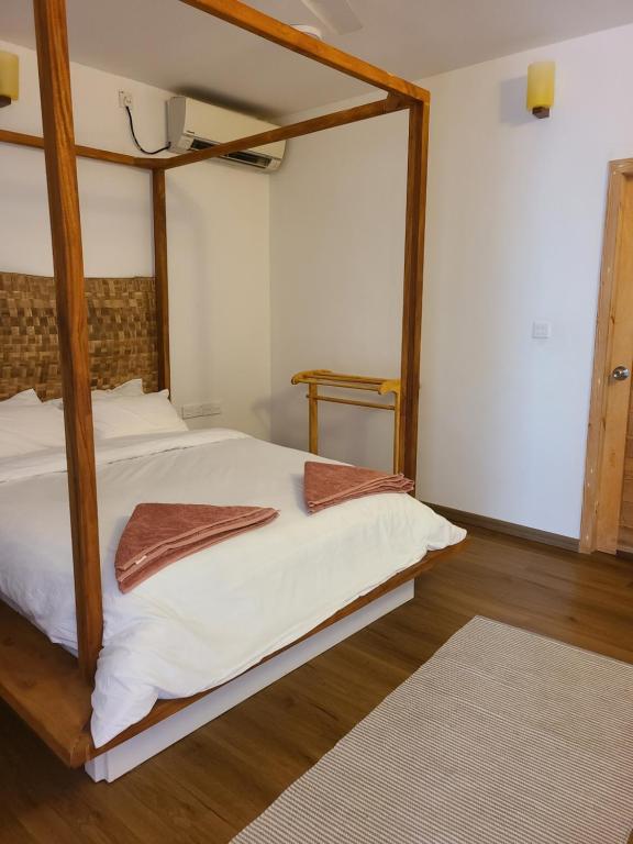 Postel nebo postele na pokoji v ubytování Island Zephyr