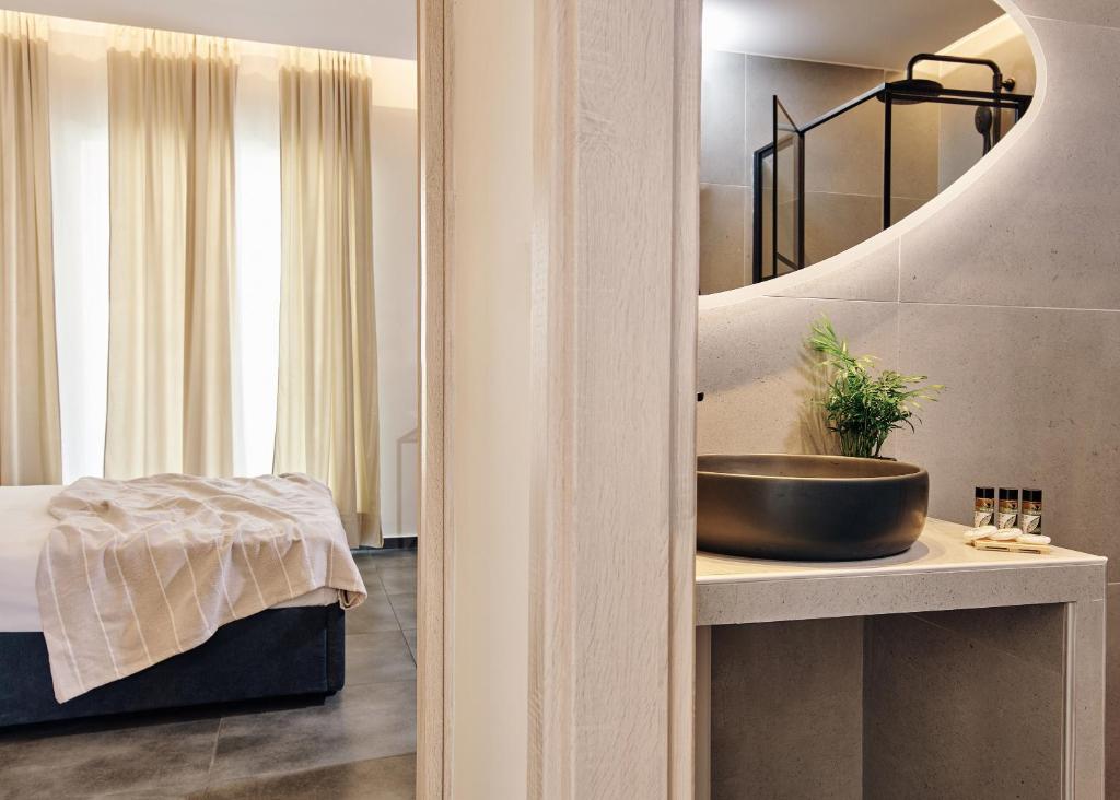 Posteľ alebo postele v izbe v ubytovaní Amaroo Suites