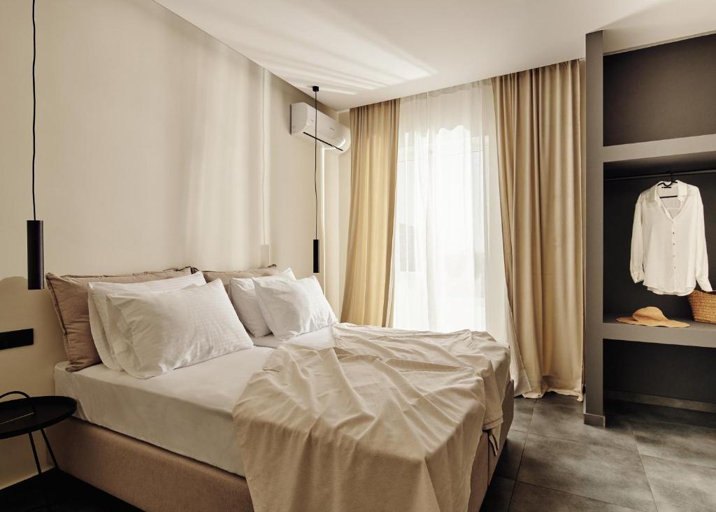 Posteľ alebo postele v izbe v ubytovaní Amaroo Suites