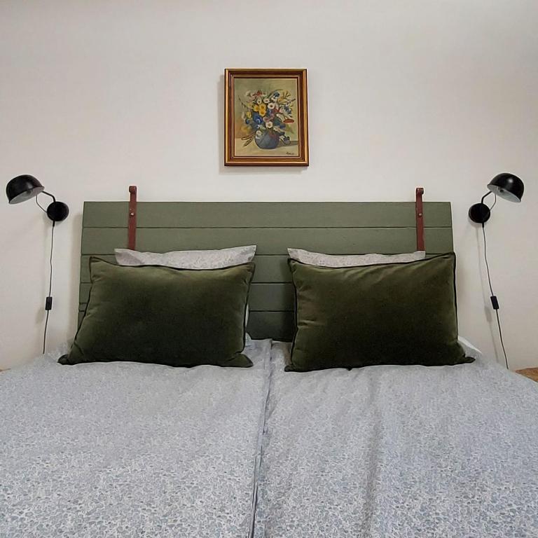 Postel nebo postele na pokoji v ubytování Lustrup Farmhouse