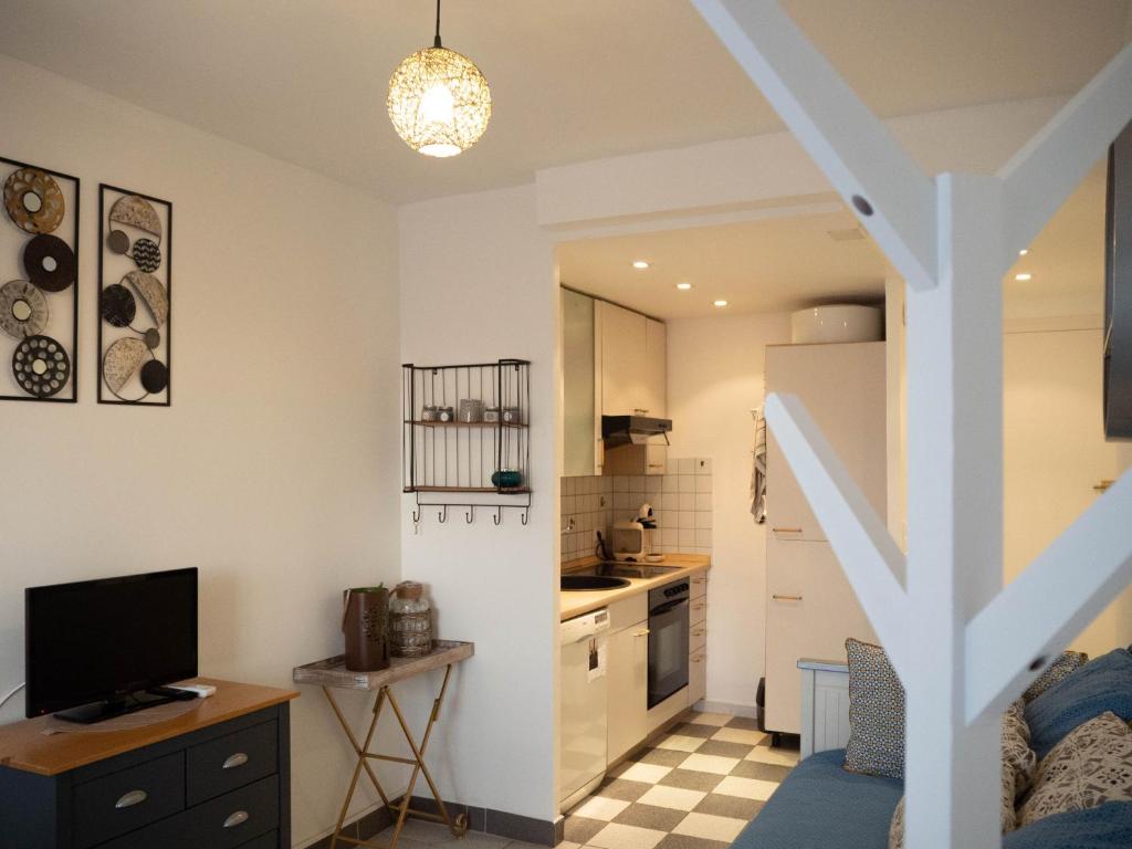Kuchyň nebo kuchyňský kout v ubytování Catalunya Apartament per 4 persones en edifici del passeig marítim amb vistes sobre la Vall d'Aro