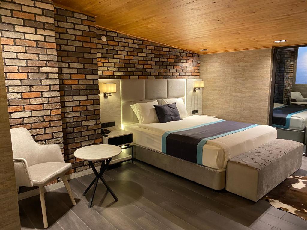 Postel nebo postele na pokoji v ubytování Elifim Resort Hotel