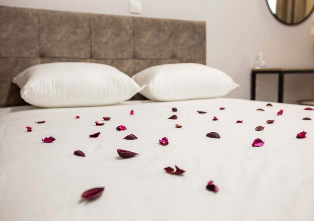 Katil atau katil-katil dalam bilik di Artemida Suites