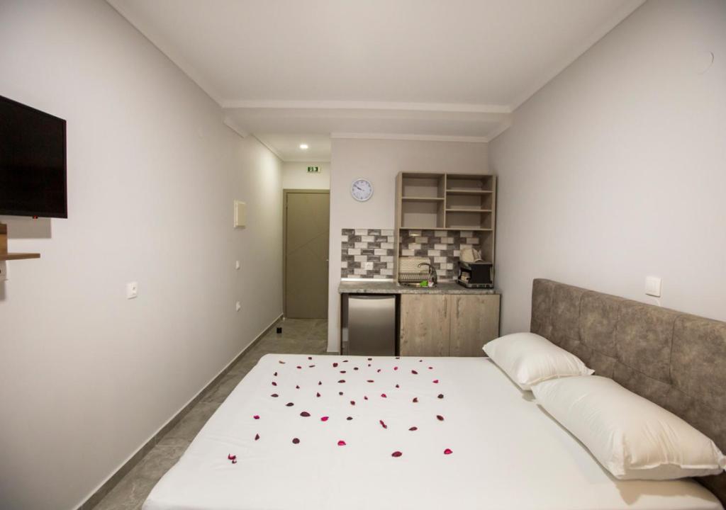 Katil atau katil-katil dalam bilik di Artemida Suites