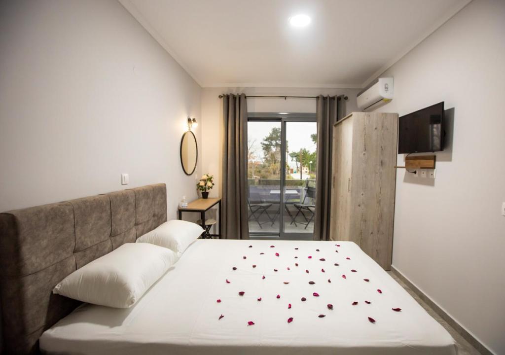 Katil atau katil-katil dalam bilik di Artemida Suites