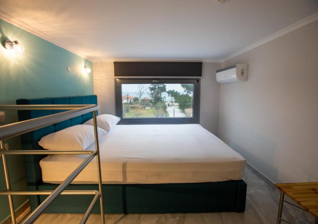 Katil atau katil-katil dalam bilik di Artemida Suites