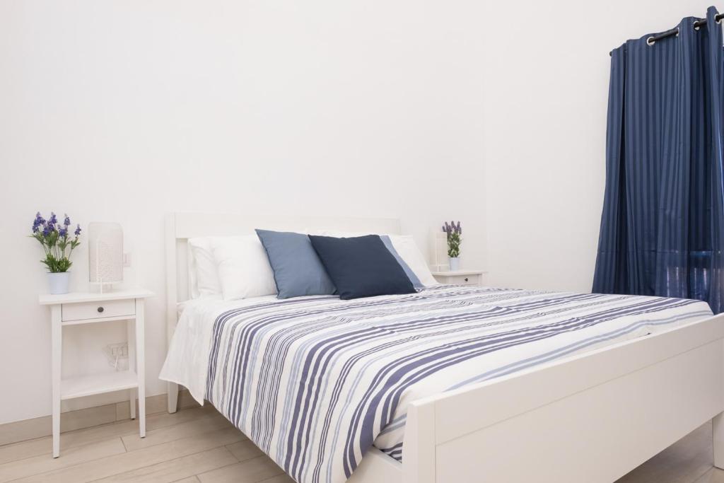 Postel nebo postele na pokoji v ubytování Ciatu Miu