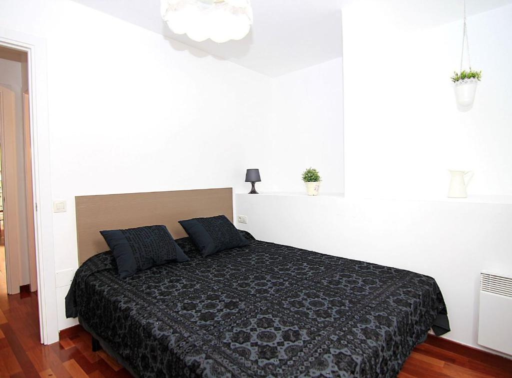 Posteľ alebo postele v izbe v ubytovaní MUN41 · MUN41 - Sagrada Família private terrace apartment