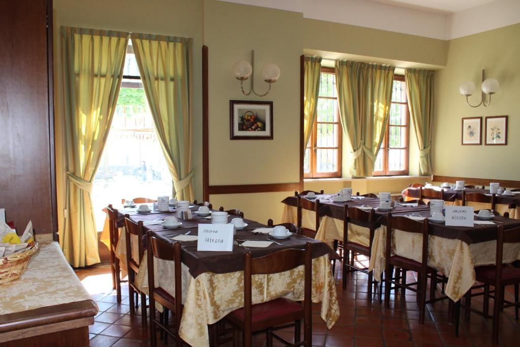 Restaurace v ubytování Hotel Il Portico by LVG Hotel Collection