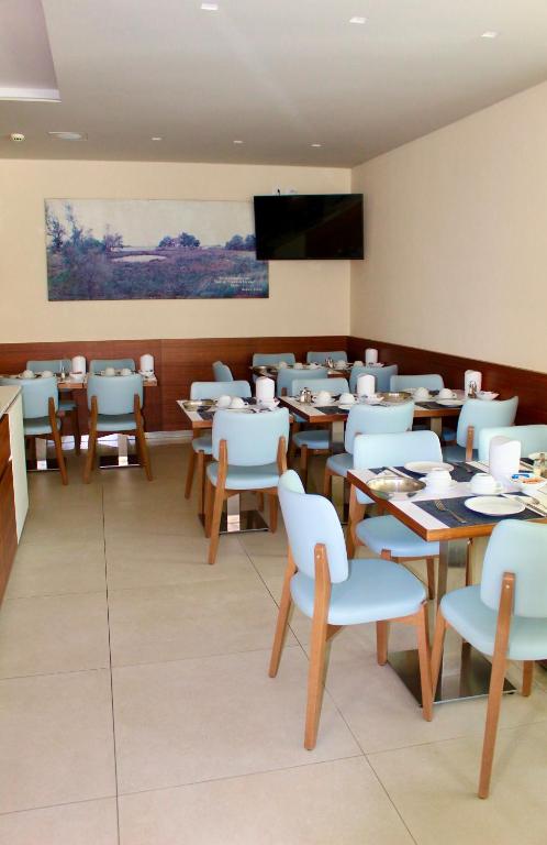 Restauracja lub miejsce do jedzenia w obiekcie Hotel Cristina