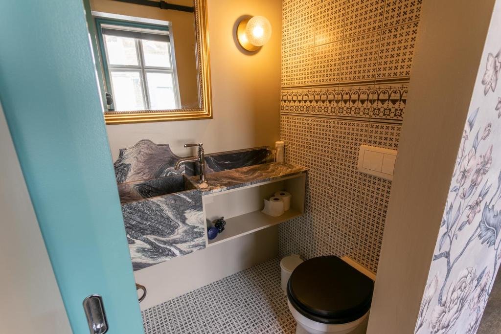 Koupelna v ubytování Hotel Siglunes