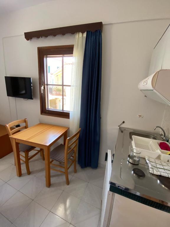 Kuchyň nebo kuchyňský kout v ubytování Victoria Studios