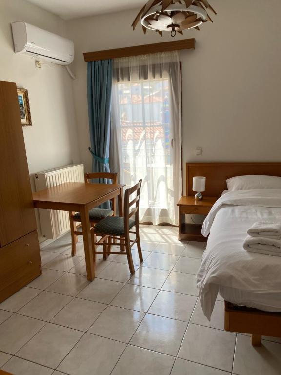 Postel nebo postele na pokoji v ubytování Victoria Studios