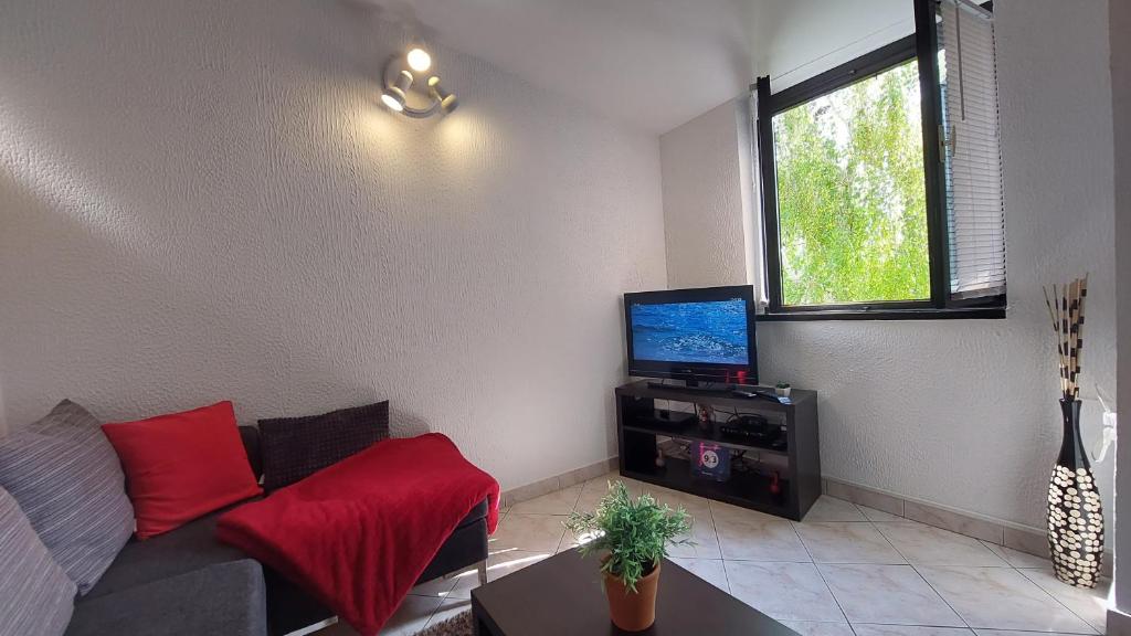 Telewizja i/lub zestaw kina domowego w obiekcie Apartment Červar