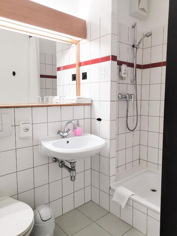 Koupelna v ubytování ACRON Hotel Wittenberg