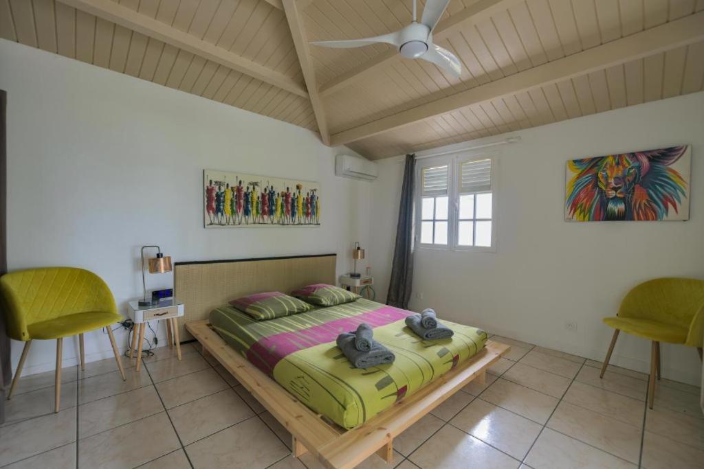 Postel nebo postele na pokoji v ubytování Villa La Belle Creole