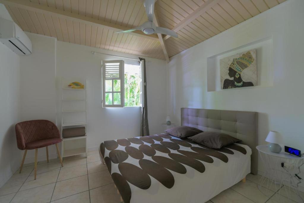 Postel nebo postele na pokoji v ubytování Villa La Belle Creole