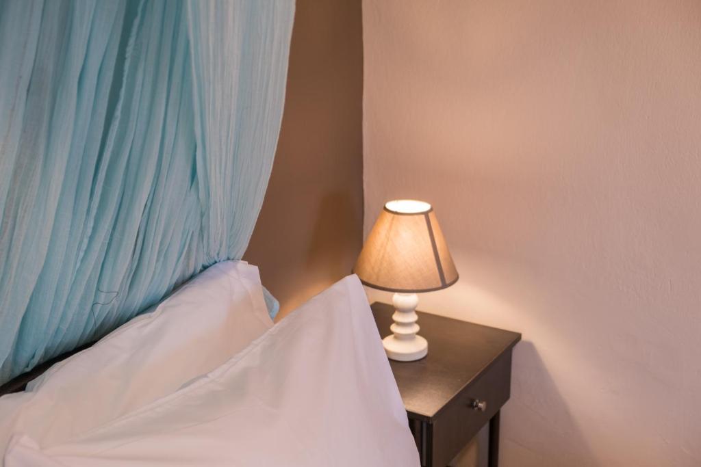 A bed or beds in a room at Mare Nostrum Apartments by Hotelius