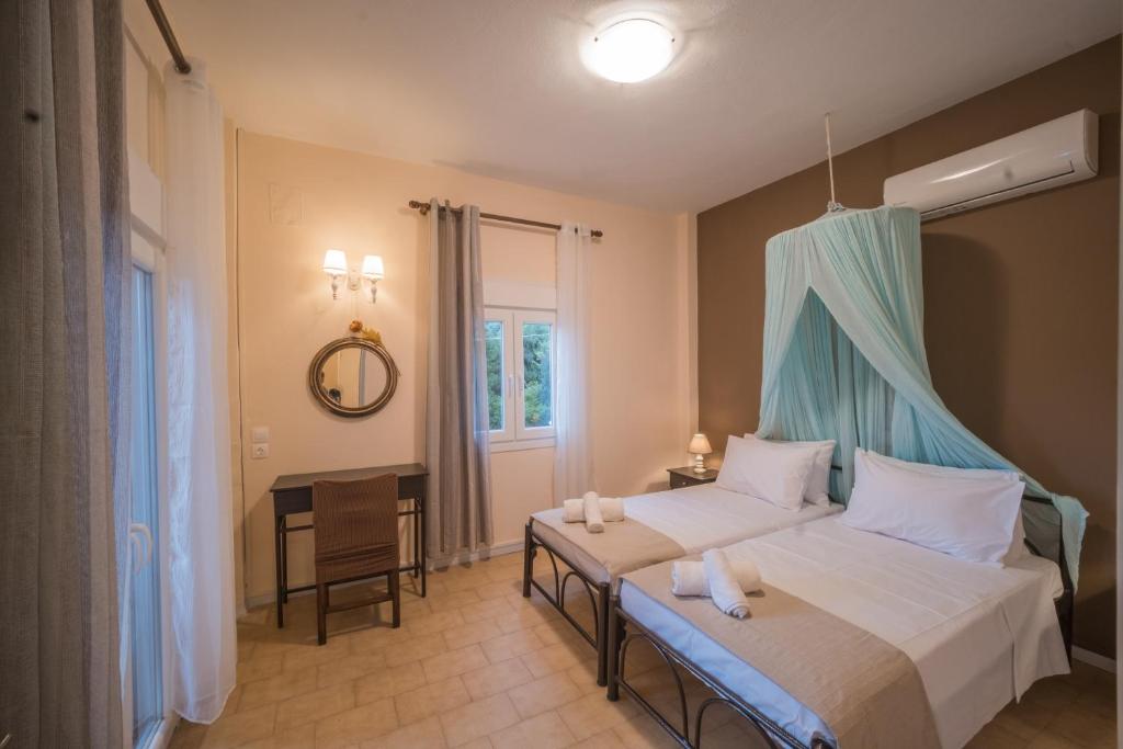 A bed or beds in a room at Mare Nostrum Apartments by Hotelius