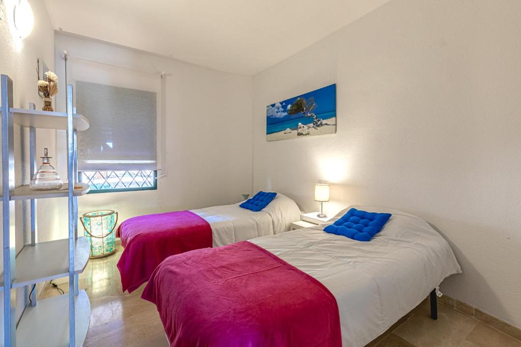 A bed or beds in a room at Apartamento Altea Nova