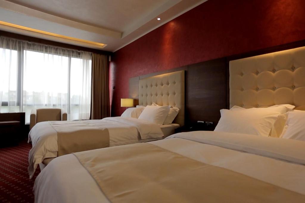 Postel nebo postele na pokoji v ubytování Orbis Design Hotel & Spa